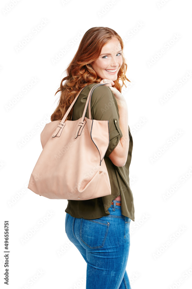 Check out my new designer bag. Shot of a young woman posing against a white background. Check out my new designer bag. Shot of a young woman posing against a white background.