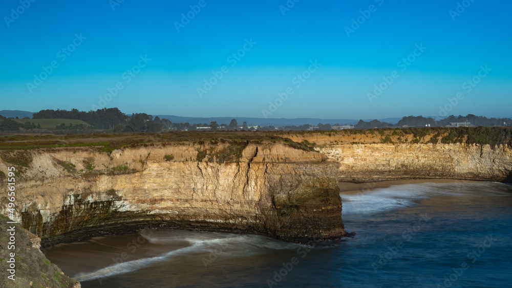 Shoreline at Wilder Ranch State Park in Santa Cruz, California, USA, featuring blue sky copy-space