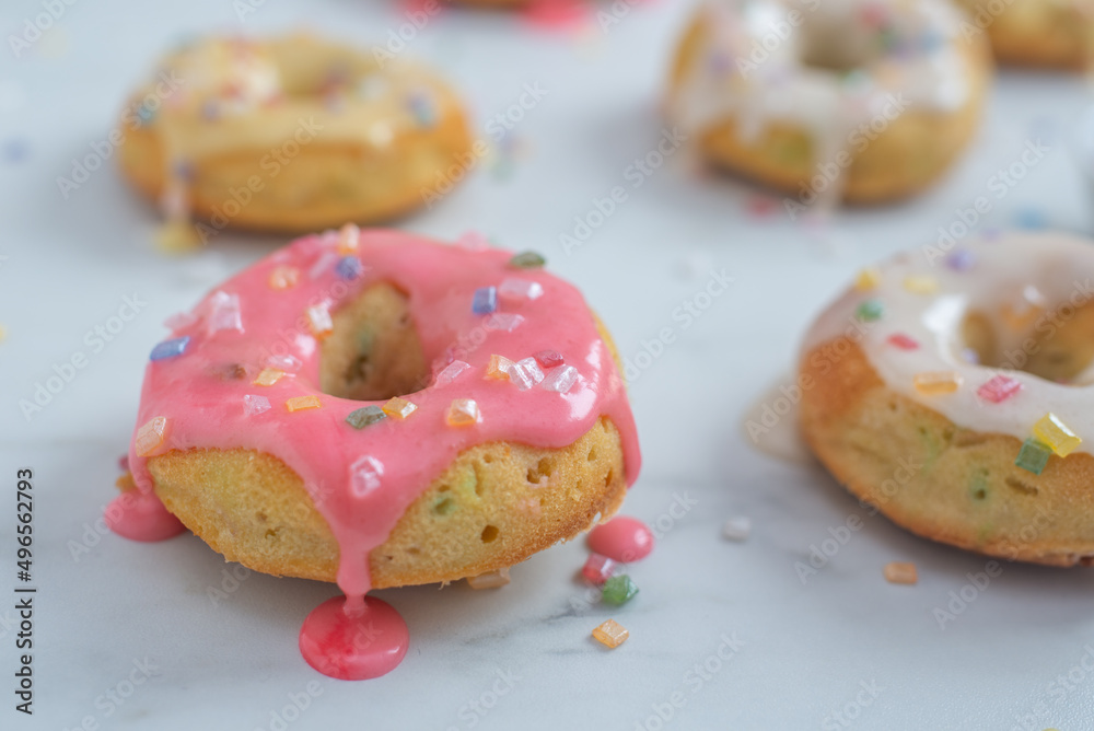 delicious sweet round donuts with colored sprinkles delicious sweet round donuts with colored sprinkles