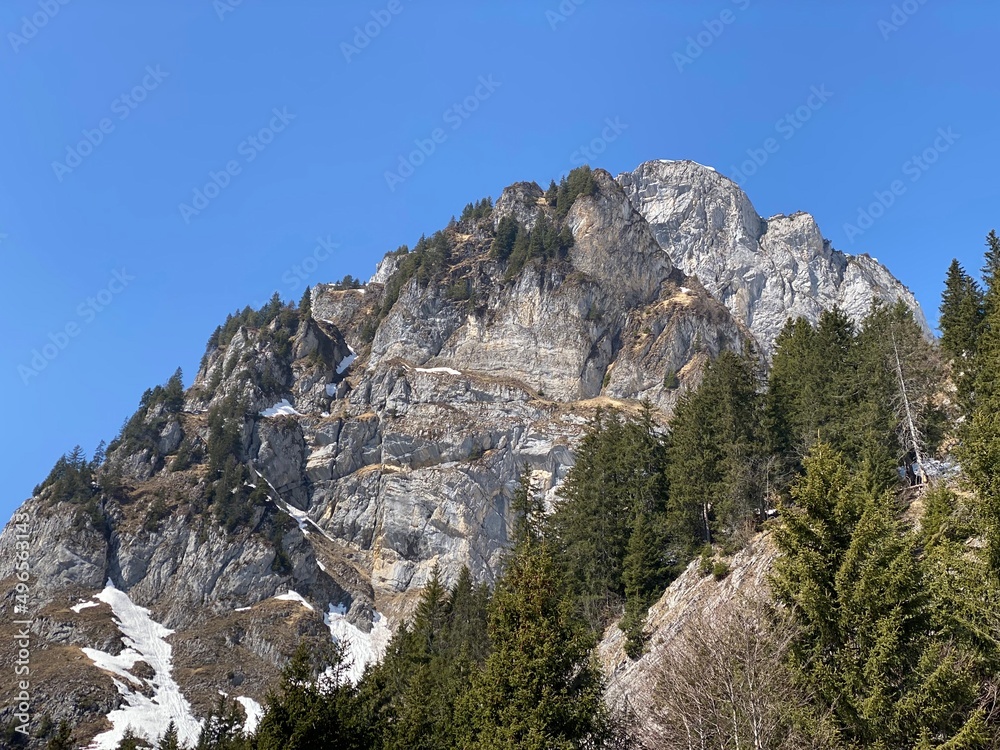 Rocky peak Mättlistock (Maettlistock or Mattlistock, 1911 m) in the Glarus Alps mountain range, over the Klöntalersee reservoir lake and Klöntal alpine valley - Canton of Glarus, Switzerland (Schweiz)