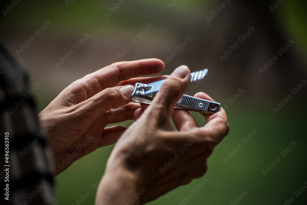 hands cutting nails, nippers, nail clippers hands cutting nails, nippers, nail clippers