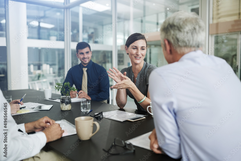 White collar business. Shot of corporate businesspeople in the office. White collar business. Shot of corporate businesspeople in the office.
