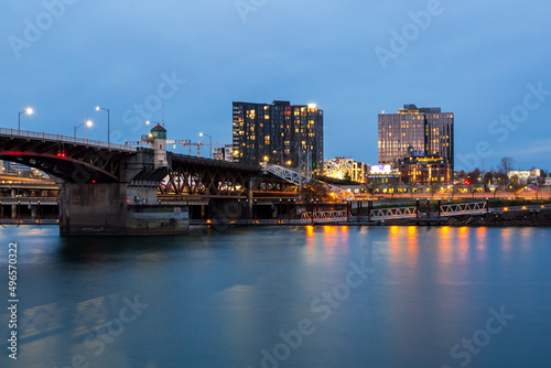 Burnside bridge over Willamette river in twilight in Portland, Oregon photo
