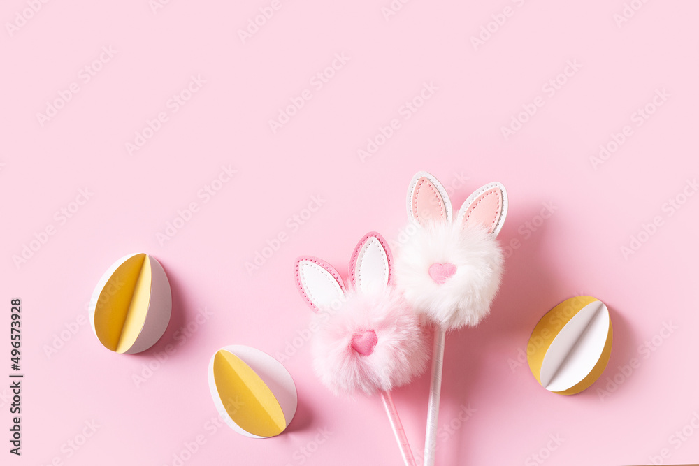 Fluffy easter decoration rabbit, easter creative concept on pink background