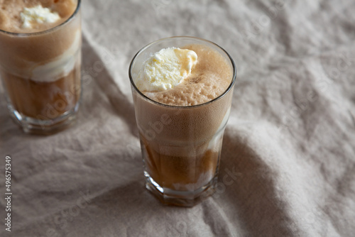 Homemade Ice Cream Float with Cola. Sweet Refreshment Drink, side view.
