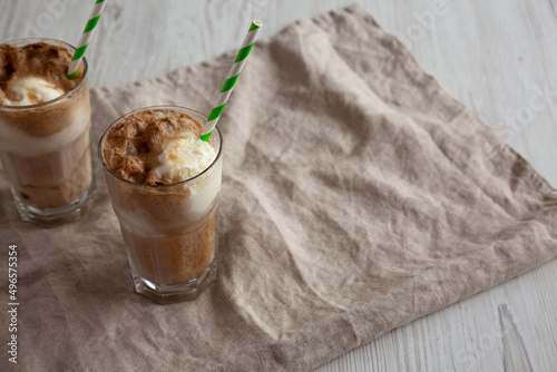 Homemade Ice Cream Float with Cola. Sweet Refreshment Drink, side view. Copy space.