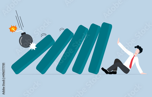 Economic recession, financial crisis, or stock market crash due to war concept. Bomb impact bar graph collapse to businessman.
