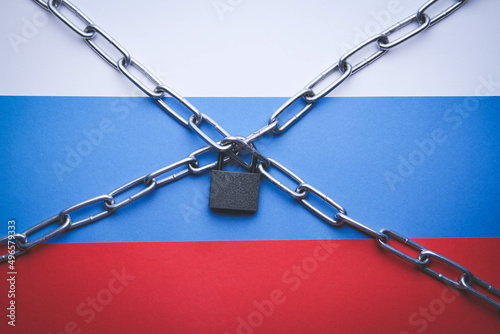 Flag of Russia and a chain with a lock. Country blocking. Prohibited.
