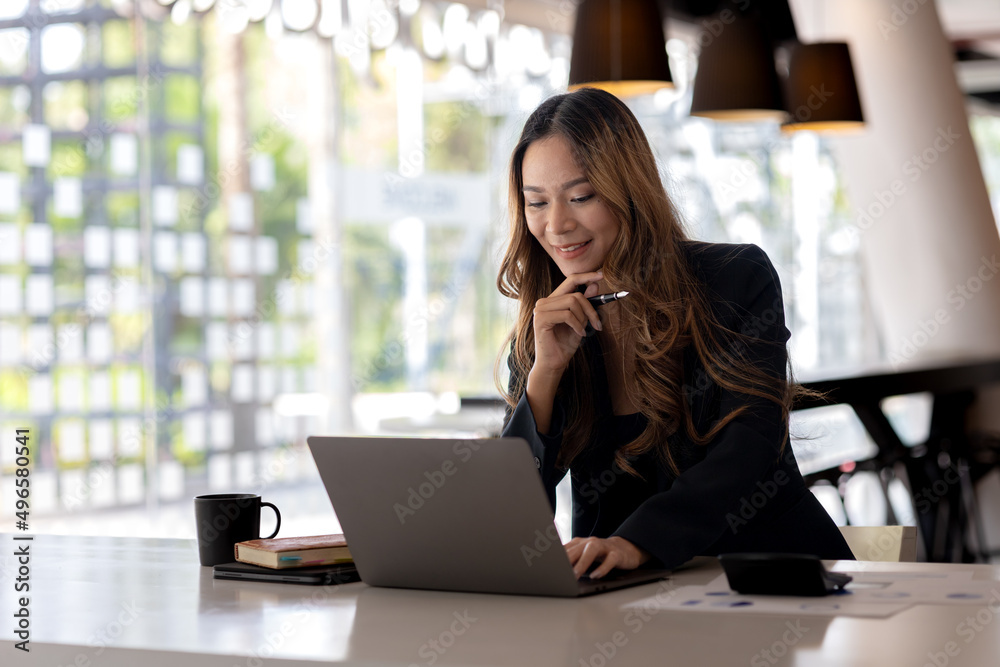 Beautiful Asian woman is a businesswoman who leads a new generation of startups, a woman who runs and manages a business plan to build confidence and stability in business, woman-led business concept. Beautiful Asian woman is a businesswoman who leads a new generation of startups, a woman who runs and manages a business plan to build confidence and stability in business, woman-led business concept.