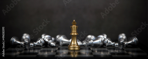 Billede på lærred Close up king chess stand with falling chess on the back concept of team player or business team and leadership strategy and human resources organization management
