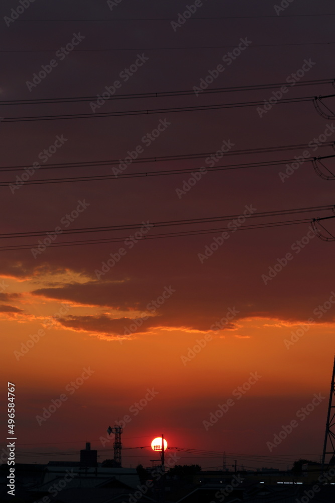 夕焼けと夕日　電線のシルエット
Sunset and sunset silhouette of electric wire 