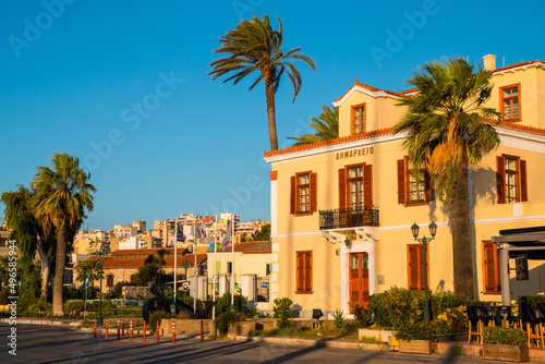 View from Kountourioti street on Lavreotiki Municipal Services building, Lavrion city and palms in the foreground © Alexander