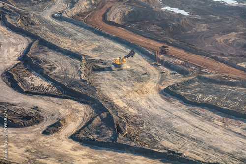 Aerial Canadian commercial excavator surface mining for Oilsands