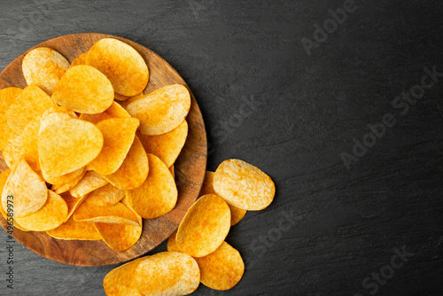 Fotografie Potato Chips on Black