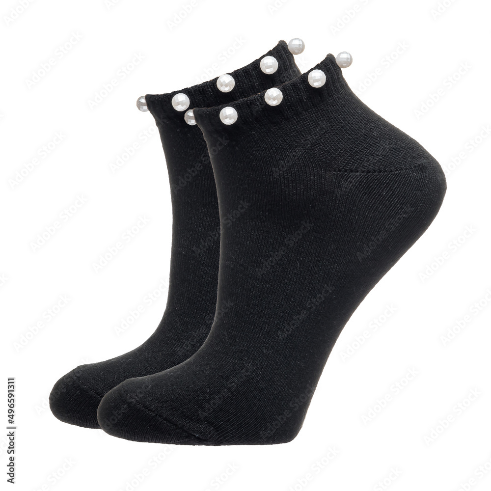 A pair of fabric socks stands on a white isolated background. Volumetric socks on a transparent mannequin. A pair of fabric socks stands on a white isolated background. Volumetric socks on a transparent mannequin.