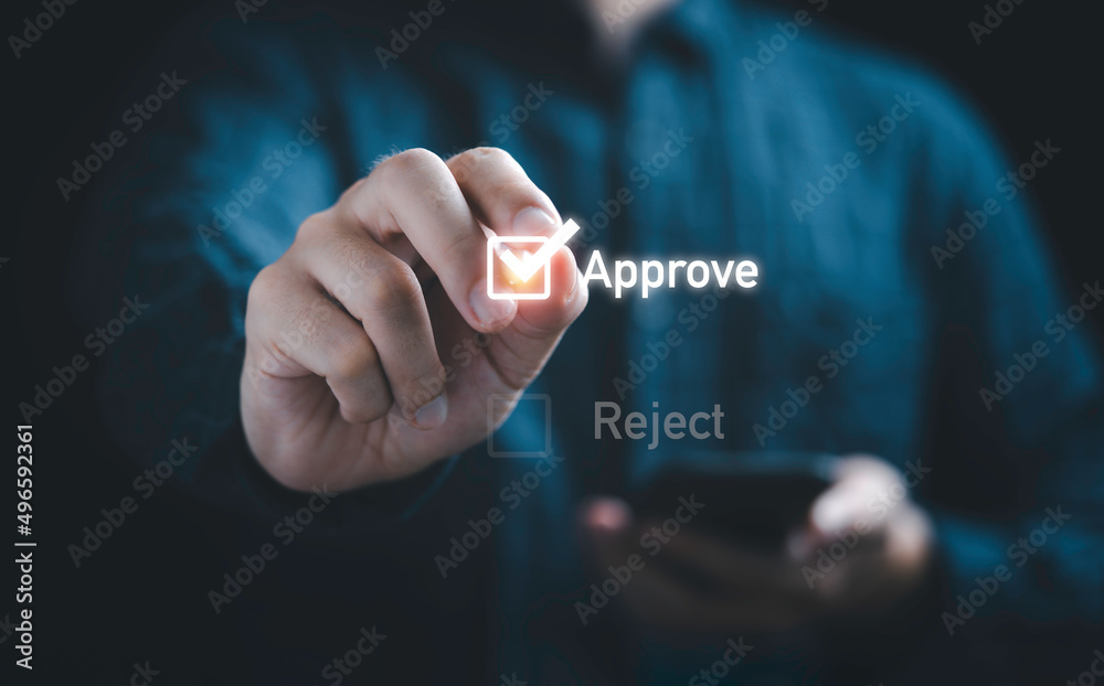Businessman writing or tick correct mark to approve document and project concept. - obrazy, fototapety, plakaty 