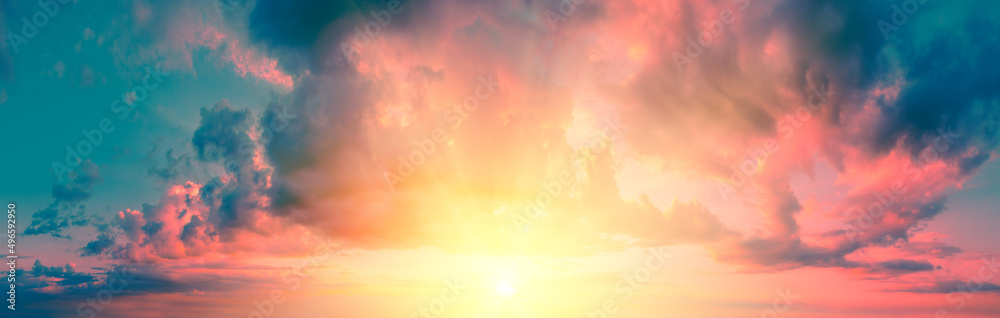 Panorama of a colorful cloudy sky at sunset. Sky texture. Abstract nature background