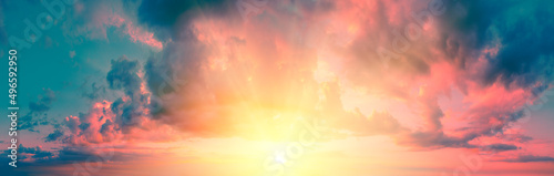 Panorama of a colorful cloudy sky at sunset. Sky texture. Abstract nature background