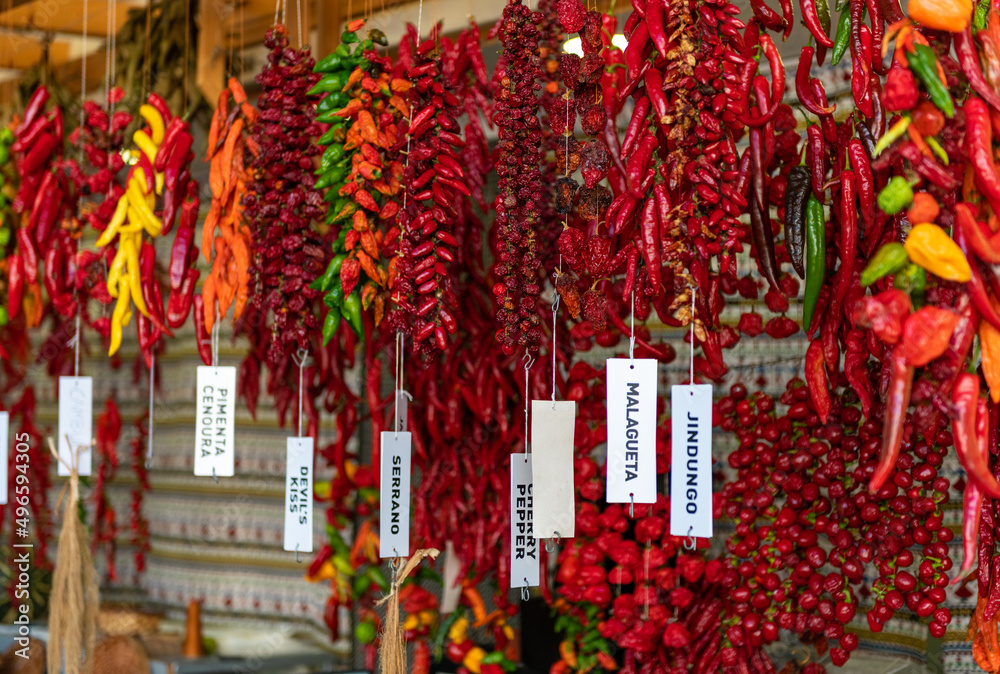 Counter with a variety of peppers in the market