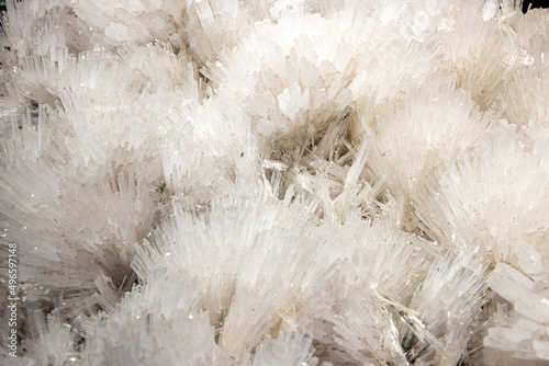 A natural mineral stone - raw Scolecite, a tectosilicate mineral of the zeolite group, a hydrated calcium silicate.
