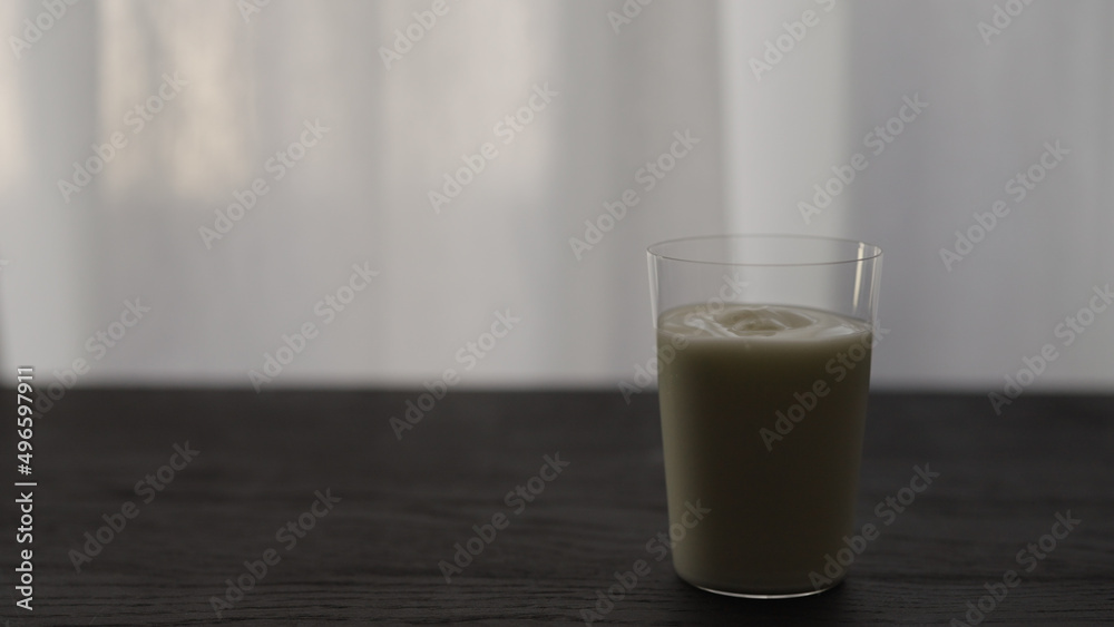 yogurt in tumbler glass with copy space yogurt in tumbler glass with copy space