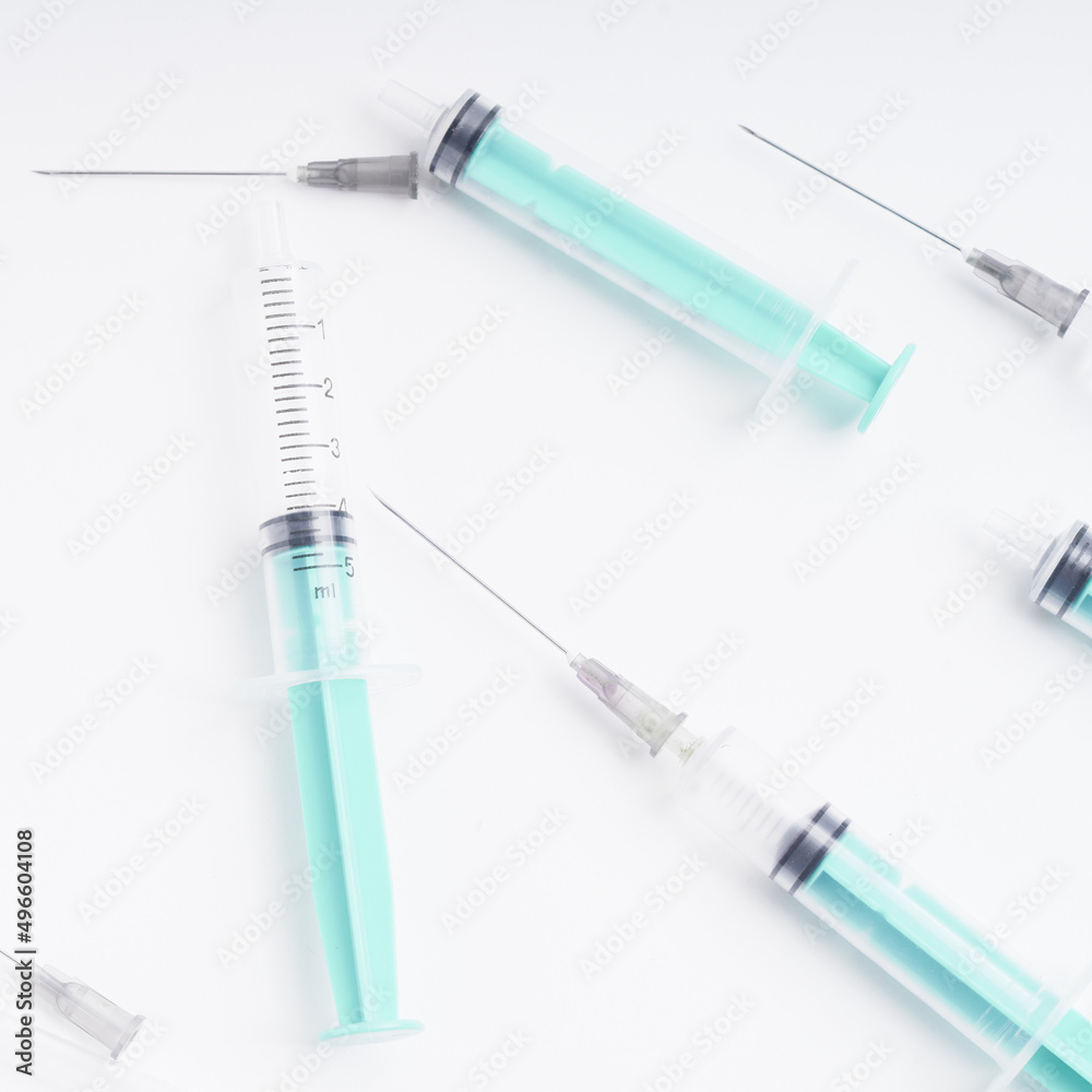 medical disposable plastic syringe for injection in the hospital isolated on a white background medical disposable plastic syringe for injection in the hospital isolated on a white background