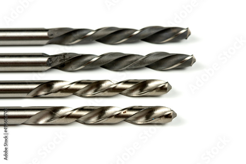 Drill bits of different sizes isolated over white background