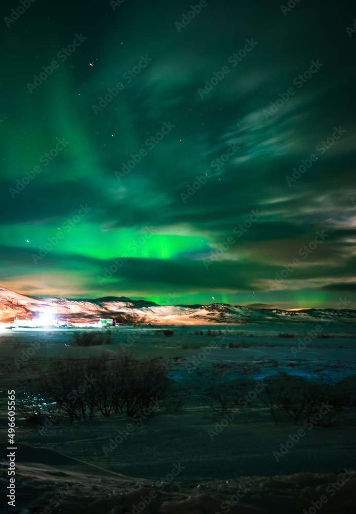 Landscape. The Northern lights in the sky beyond the Arctic Circle.