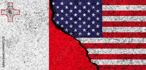 USA and Malta. Flags painted on cracked concrete wall. United States, America. Partnership, relationships and conflict concept. Banner background photo