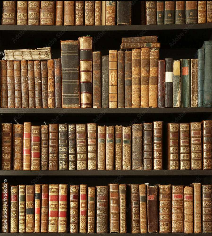 old books on wooden shelf