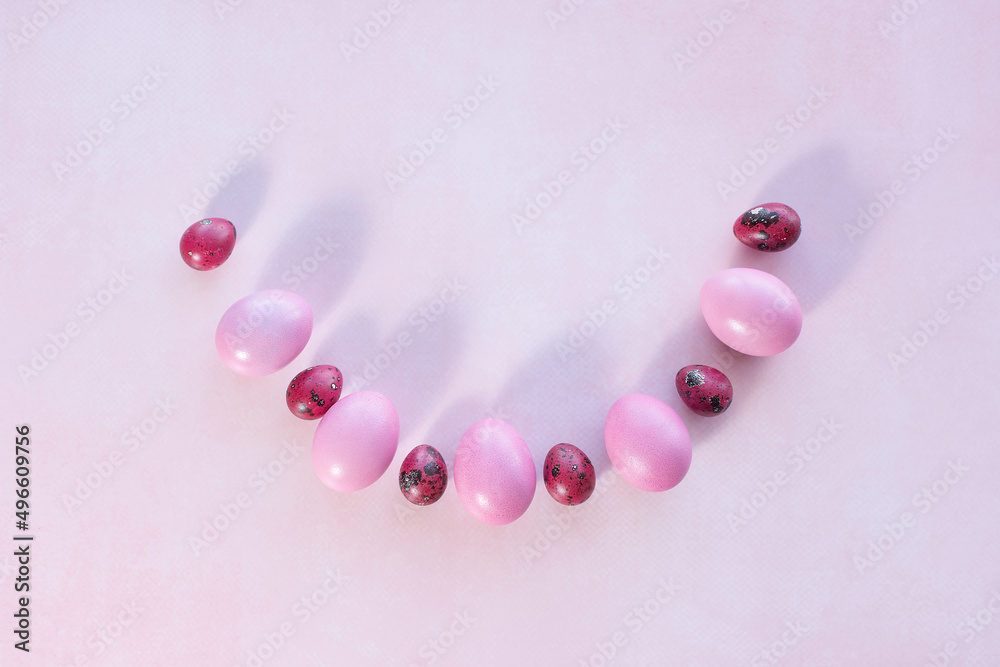 pink easter eggs on pink background with place for text. Minimal pink easter eggs on pink background with place for text. Minimal