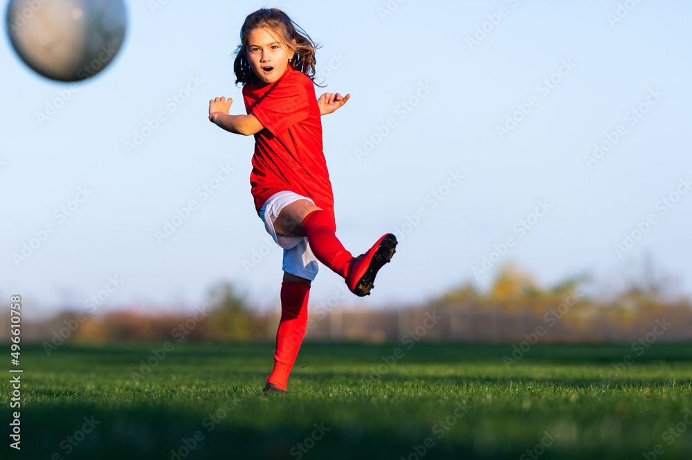 Little girl in a soccer training Little girl in a soccer training