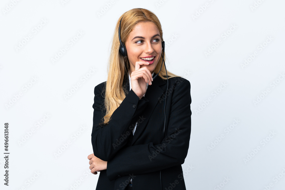 Young telemarketer woman over isolated white background looking side Young telemarketer woman over isolated white background looking side