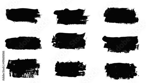 set of black strokes of paint isolated on white background
