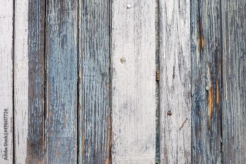 Texture of aged wood painted and degraded by the passage of time. Vertical boards.