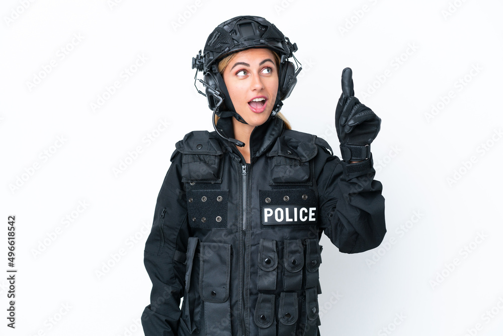 SWAT caucasian woman isolated on white background thinking an idea pointing the finger up