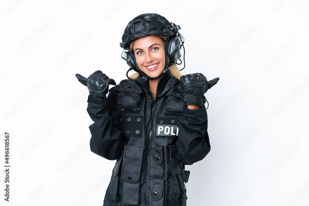 SWAT caucasian woman isolated on white background with thumbs up gesture and smiling SWAT caucasian woman isolated on white background with thumbs up gesture and smiling