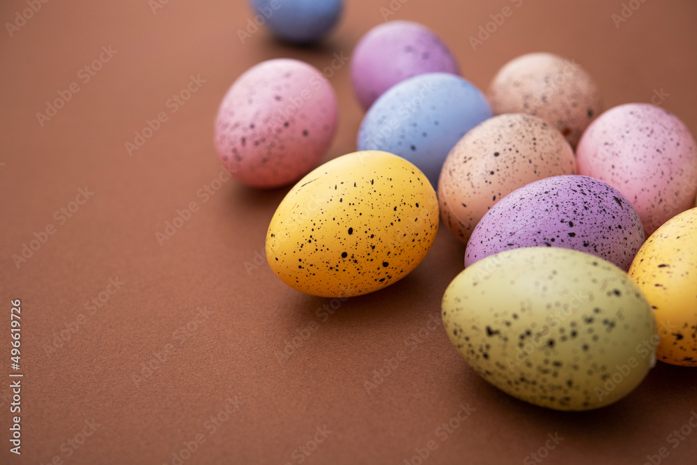 Colored easter eggs on a brown background Colored easter eggs on a brown background