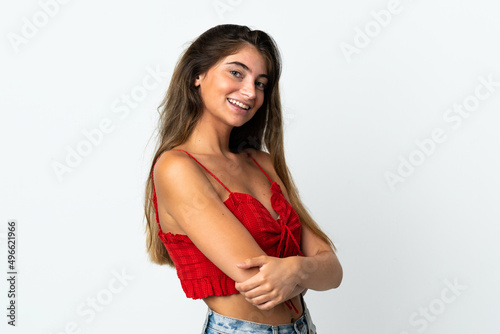 Young caucasian woman isolated on white background with arms crossed and looking forward