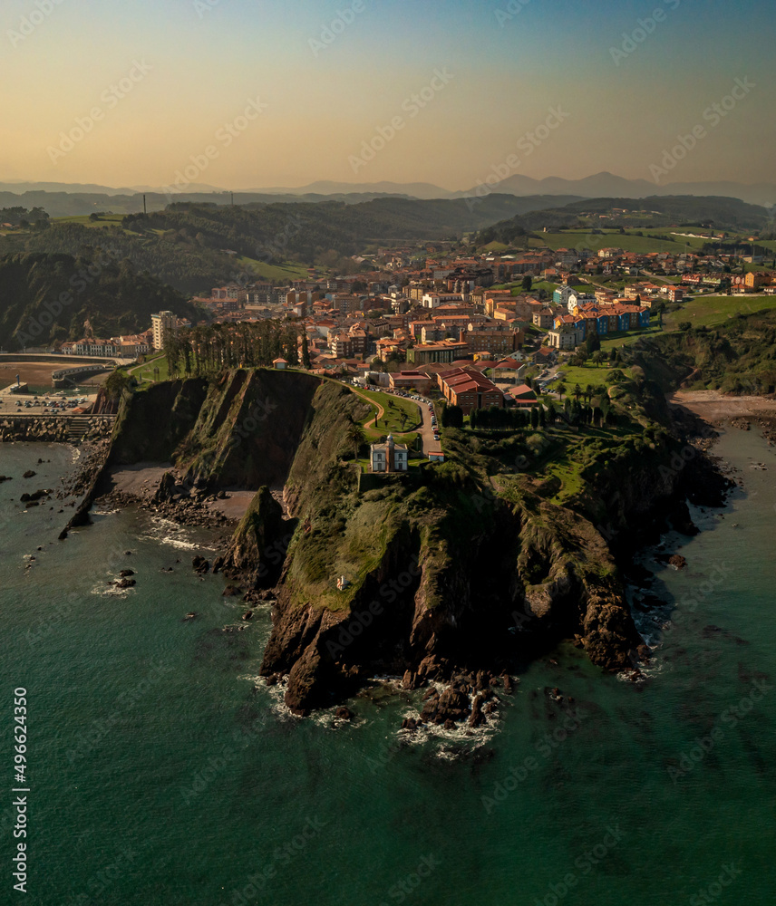 Aerial view of the town of Candas and its lighthouse, Asturias, Spain.