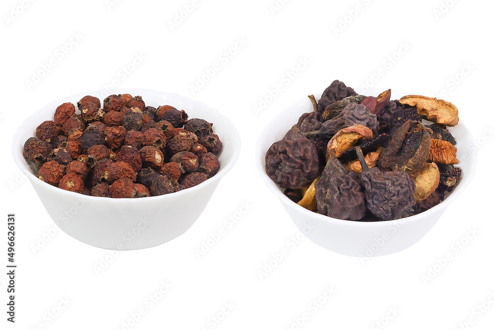 Dry fruits in a white bowl on an isolated white background. Dry fruits in a white bowl on an isolated white background.