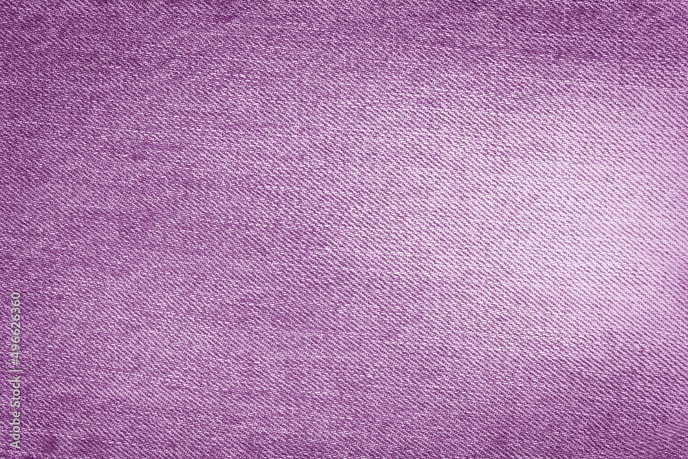 Fototapeta premium Denim background texture for design. Canvas denim. Denim purple jeans fabric.