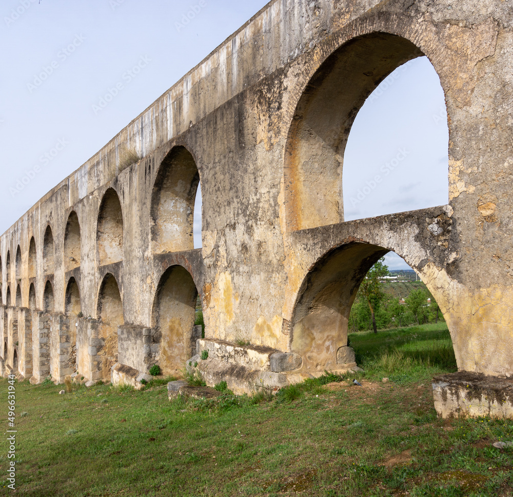 view of the historic landmark Amoreira Aqueduct in Elvas