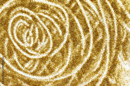 Closeup of golden glitter d...