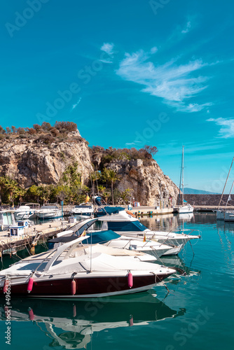 Bay area situated in la provincial de Granada. Beautiful harbour with luxury yachts docked in a small bay. All the dock area surrounded by restaurants