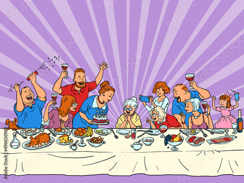Grandma birthday, a family holiday. Anniversary. Relatives at the festive table with food and cake