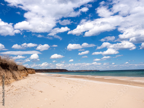 Beautiful beach, sea and cloudy blue sky. photo