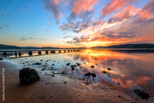 Ταπετσαρία sunset over a body of water in woy woy on nsw central coast