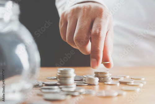 saving energy and money concept. idea for save or investment. concept saving money for finance accounting to arrange coins into growing concept, Creative ideas for saving money concept.