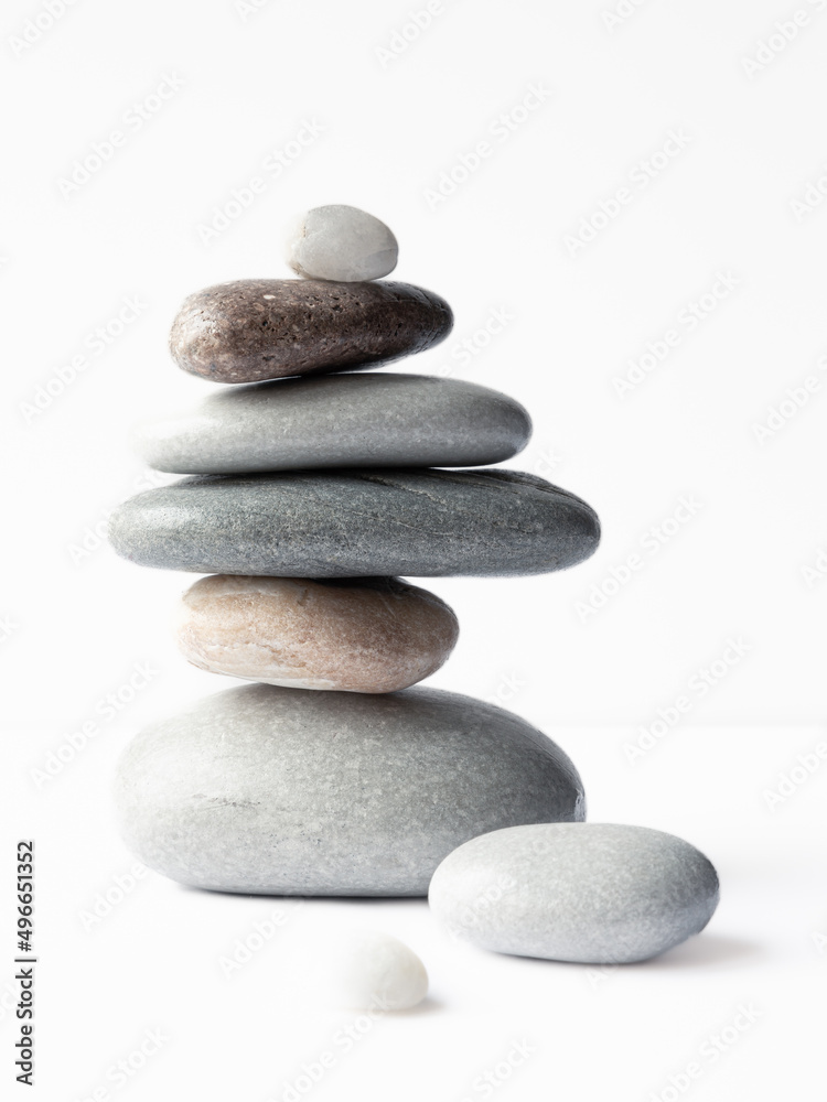 Closeup view of a pyramid of many pebbles of various sizes, shapes, and colors Closeup view of a pyramid of many pebbles of various sizes, shapes, and colors